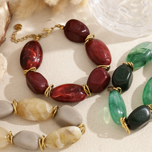 Bracelet perles ovales en résine marbrée