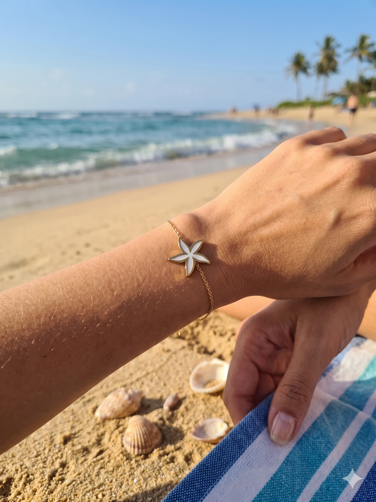 Bracelet doré étoile de mer pavée et nacrée