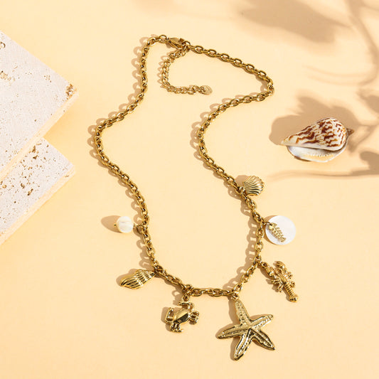 Collier doré charms étoile de mer, crabe et homard