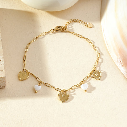 Chaîne de cheville dorée charms cœurs