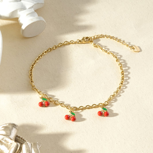 Chaîne de cheville dorée pendante 3 cerises