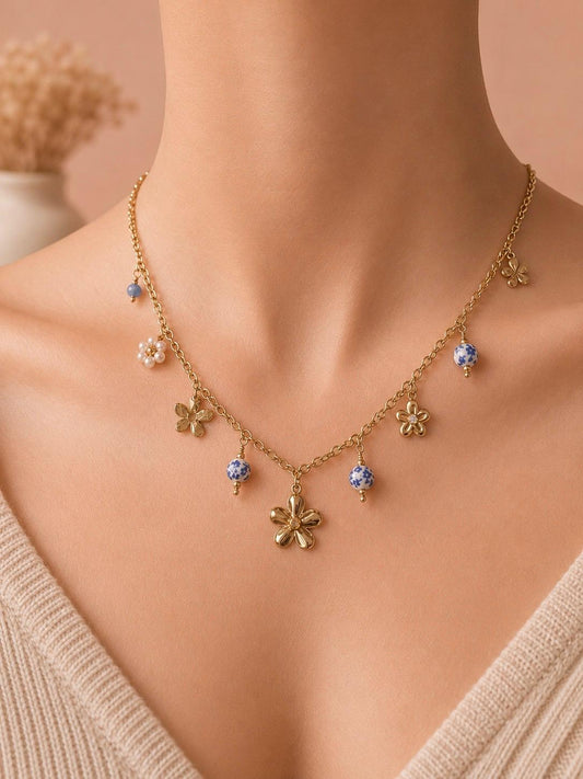 Collier fleurs et perles porcelaine doré