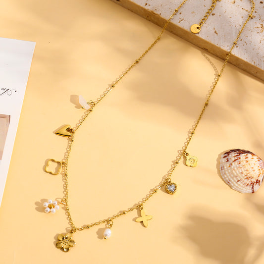 Collier doré breloques florales