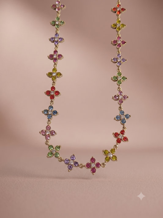 Collier doré fleurs multicolores serties de strass