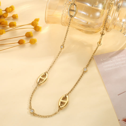 Collier sautoir chaîne maillons marine et oxydes de zirconium blancs