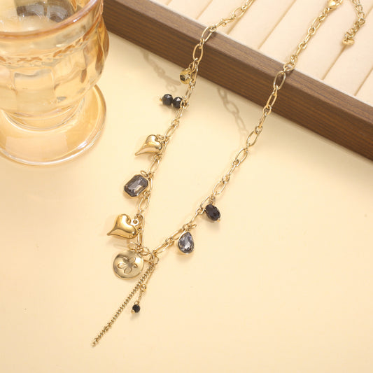 Collier chaîne maillon breloques mixtes