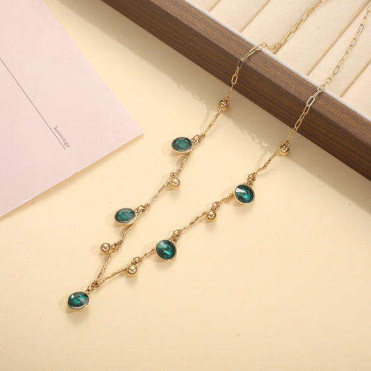 Collier chaîne cristaux ronds sertis