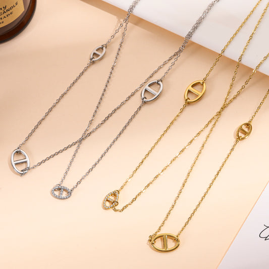 Collier sautoir design maillons ovales et strass