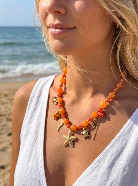 Collier perles à charms marins dorés