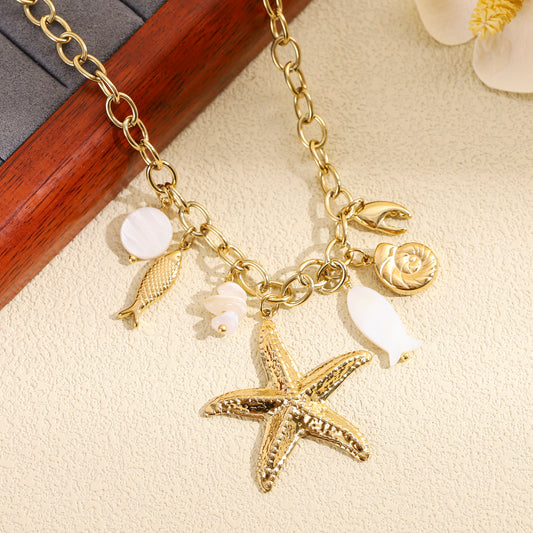 Collier doré charms marins étoile poisson coquillage