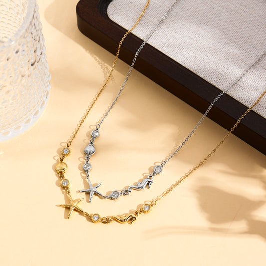 Collier étoile de mer, coquillage et hippocampe avec strass