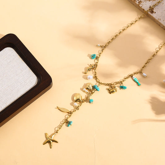 Collier doré en Y pendentifs marins avec pierres turquoise