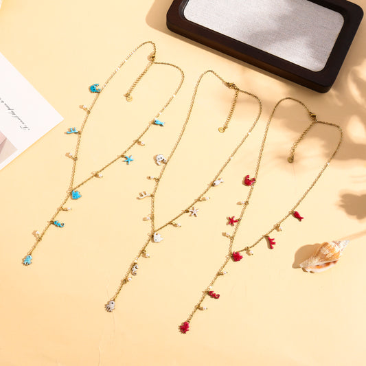 Collier doré en Y à breloques marines émaillé