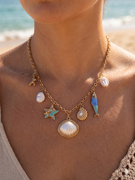 Collier doré coquillage perlé, étoile de mer et poisson