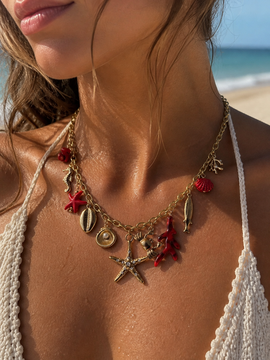 Collier doré charms marins, corail et étoile