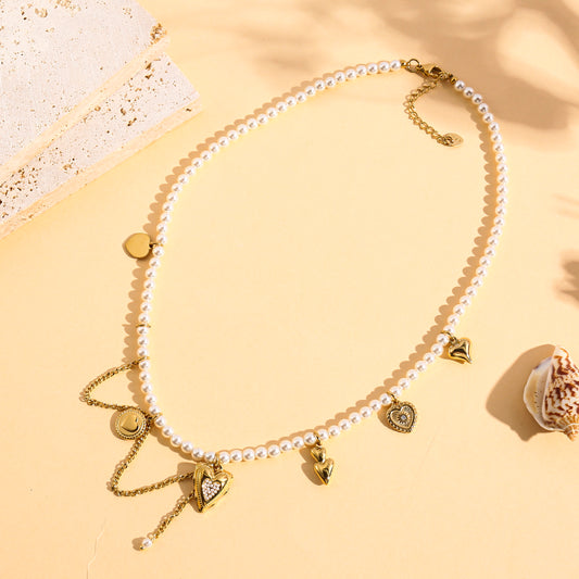 Collier doré chaîne perlée charms cœurs