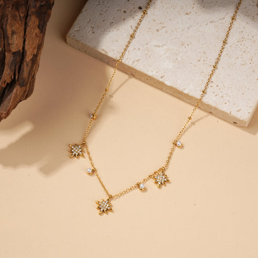 Collier étoiles serties et perles