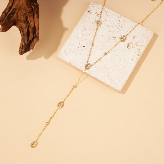 Collier chaîne fine anneaux sertis chute