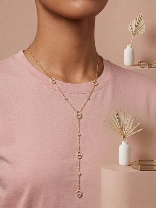 Collier chaîne fine anneaux sertis chute