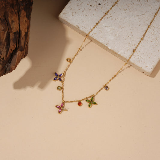 Collier doré fleurs multicolores serties