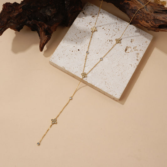 Collier sautoir Y fleurs et strass