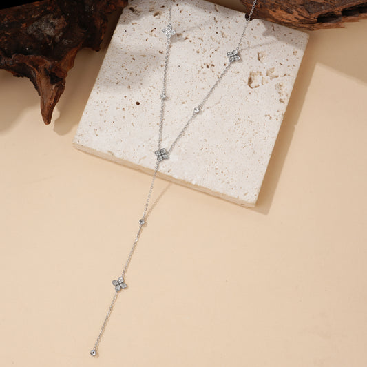 Collier sautoir Y fleurs et strass