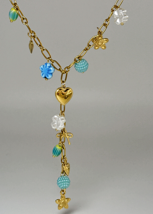 Collier doré en Y à pampilles florales et perles turquoise
