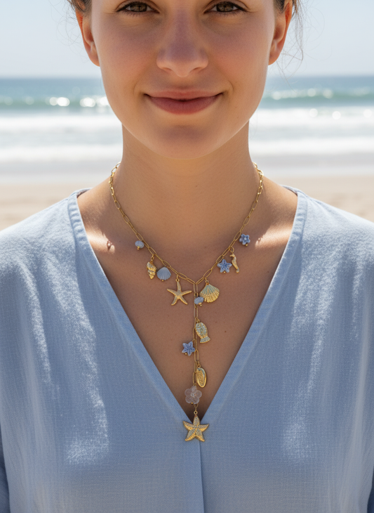 Collier doré en Y charms marins et fleurs bleu clair