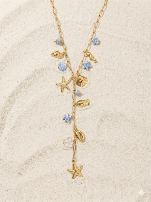 Collier doré en Y charms marins et fleurs bleu clair