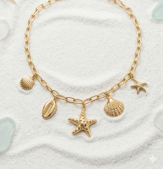 Collier doré charms étoiles de mer et coquillages