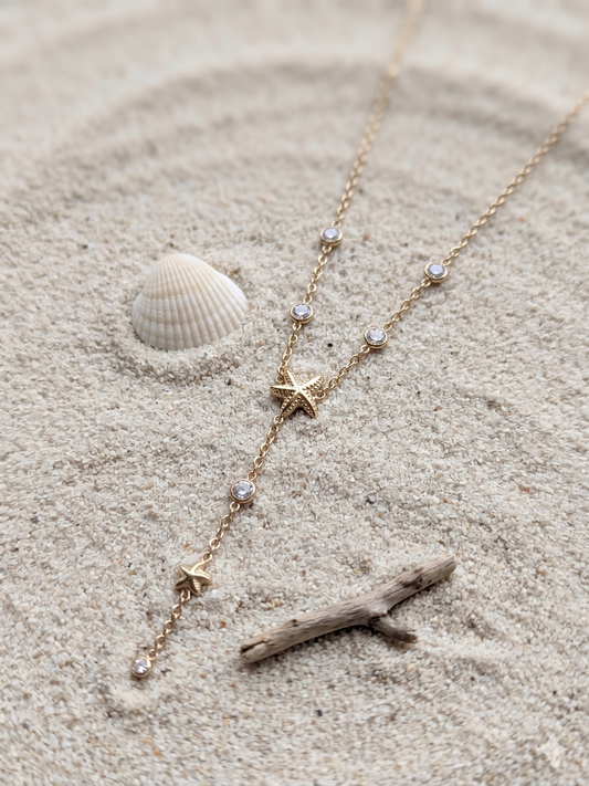 Collier doré en Y étoile de mer à pendentif strass