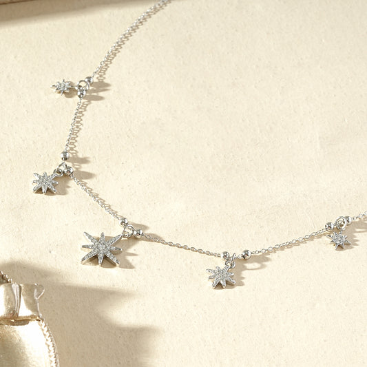 Collier chaîne étoiles scintillantes pendantes