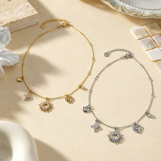 Collier breloques mixtes soleil étoile