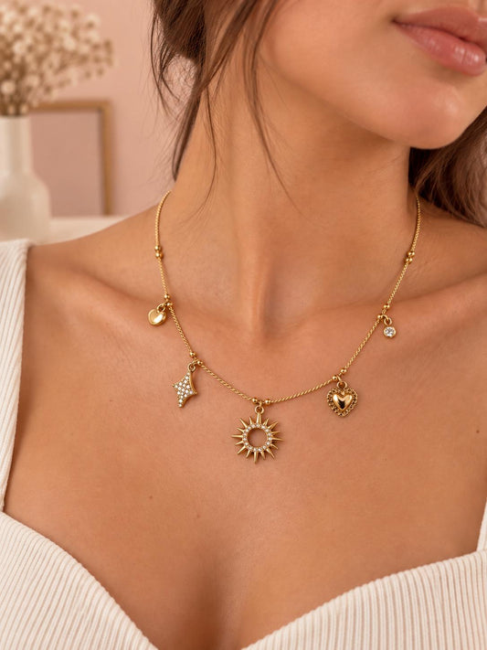 Collier breloques mixtes soleil étoile