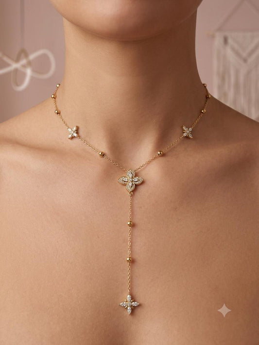 Collier chaîne perlée trèfles sertis