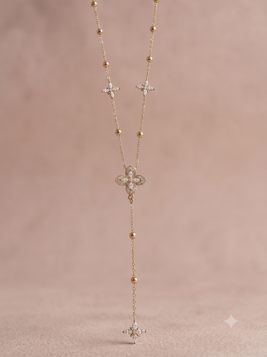 Collier chaîne perlée trèfles sertis