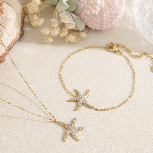 Collier doré étoile de mer sertie