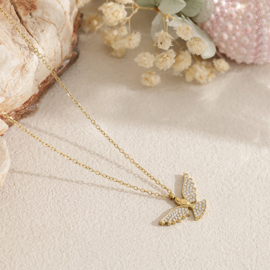 Collier colombe et ailes pavées de strass