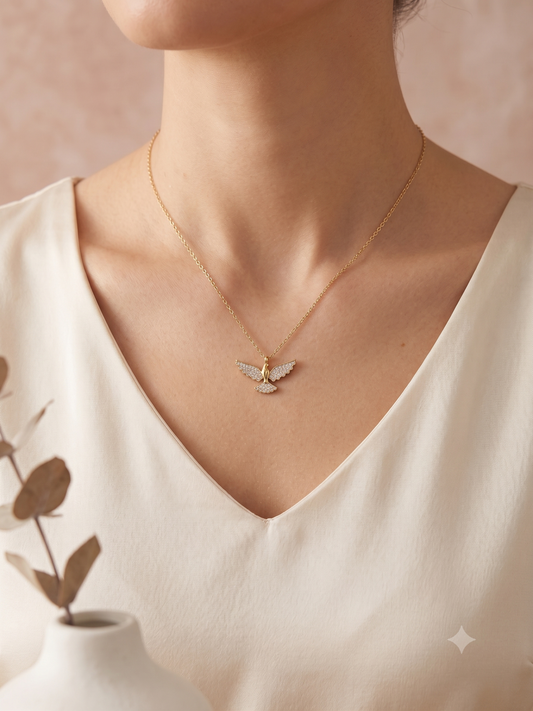 Collier colombe et ailes pavées de strass