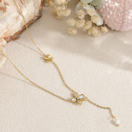 Collier trèfle à quatre feuilles pendant bille