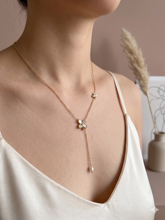 Collier trèfle à quatre feuilles pendant bille