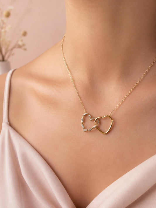 Collier double cœurs entrelacés