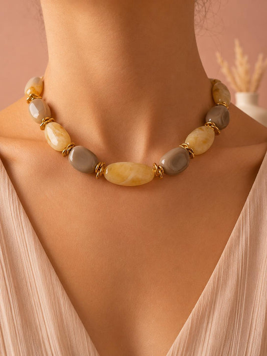 Collier perles ovales en résine marbrée