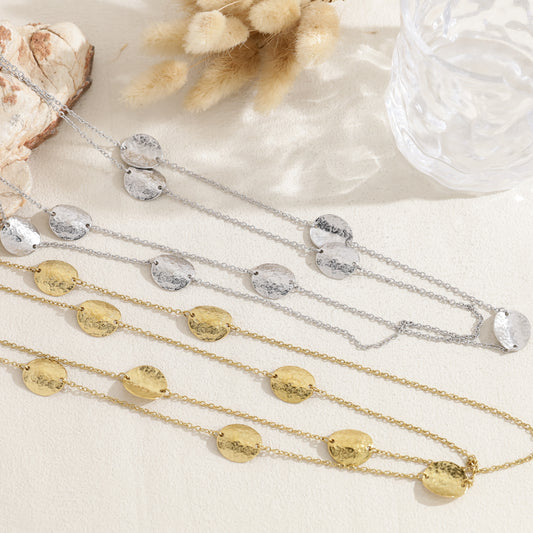 Collier double rang médaillons martelés