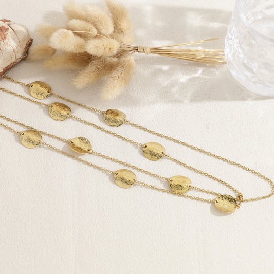 Collier double rang médaillons martelés