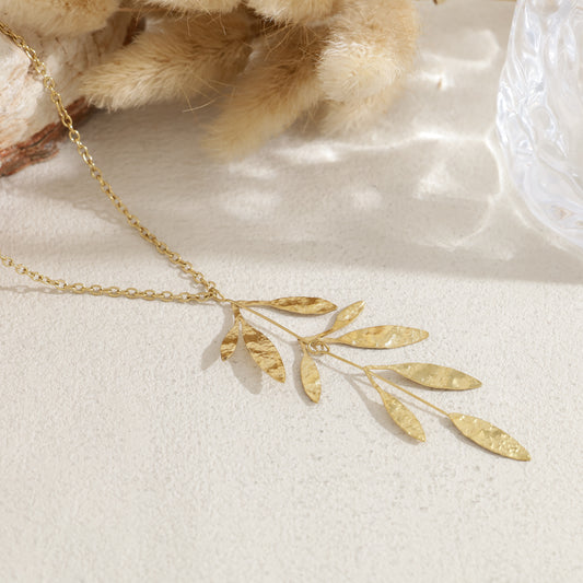 Collier long sautoir pendentif branche de feuilles