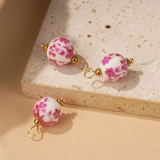 Lot de 3 pendentifs billes en porcelaine rose