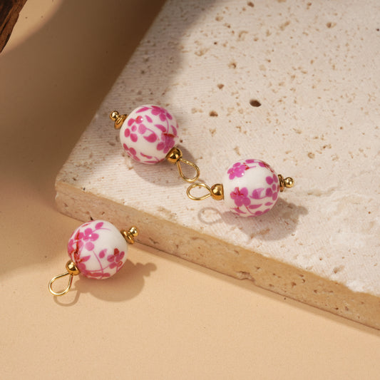 Lot de 3 pendentifs billes en porcelaine rose