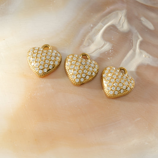 Lot de 3 pendentifs dorés en forme de cœurs strassés