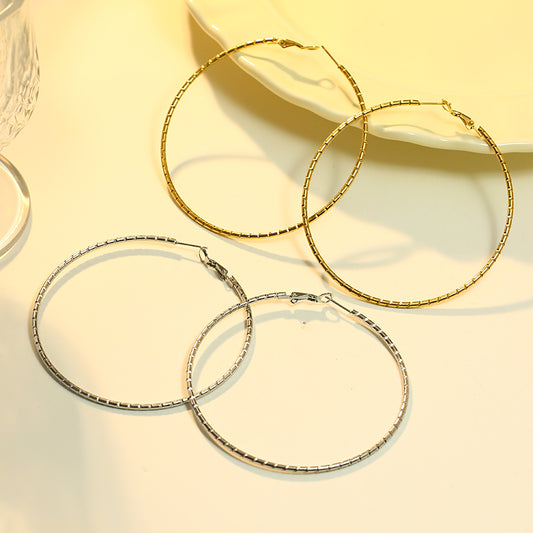 Boucles d'oreilles Argentées Créoles 7 cm de diamètre